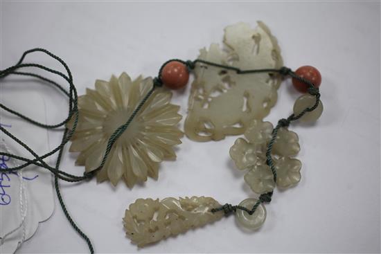 Four Chinese celadon bowenite jade flower and insect plaques, Yuan / Ming dynasty, the largest 4cm, damage to butterfly plaque